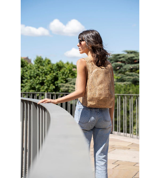 snake skin cork Arsayo backpack with a woman model