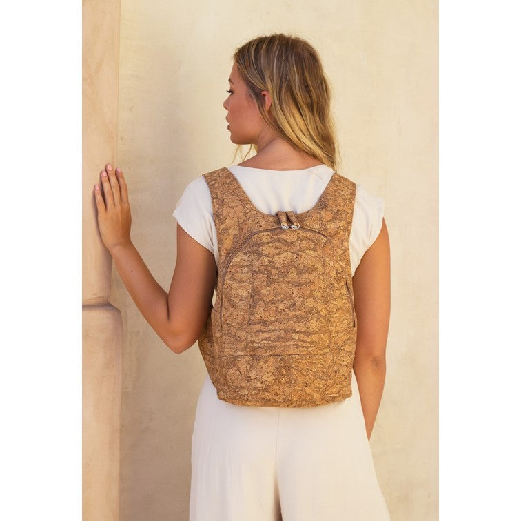 photo of the light natural cork Arsayo backpack with a woman model